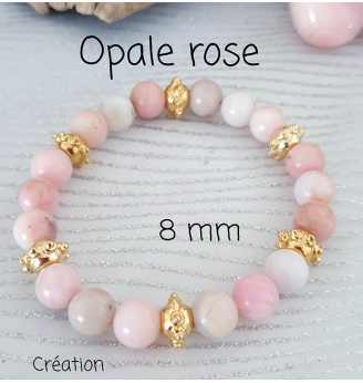 Bracelet en Opale rose , perles 8 mm , finitions dorées .