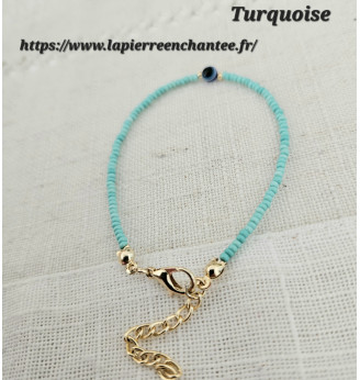 Bracelet en Turquoise et Œil porte bonheur .
