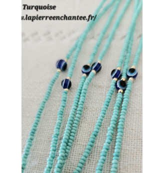 Bracelet en Turquoise et Œil porte bonheur .