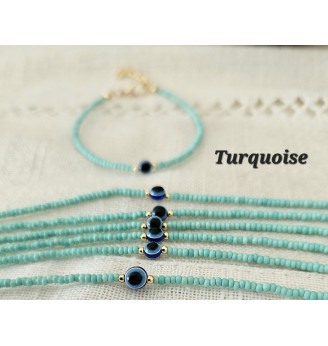 Bracelet en Turquoise et Œil porte bonheur .