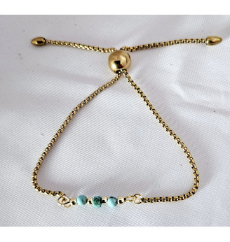 Bracelet ajustable chaîne dorée et perles en Turquoise.