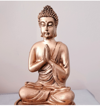 Bouddha doré en résine et sa bougie