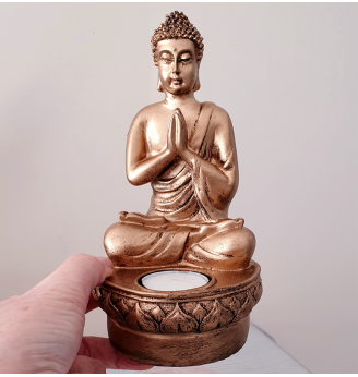 Bouddha doré en résine et sa bougie