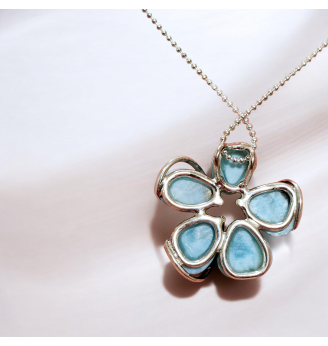 Pendentif en Larimar, sertissage Fleur en Argent massif 925 .